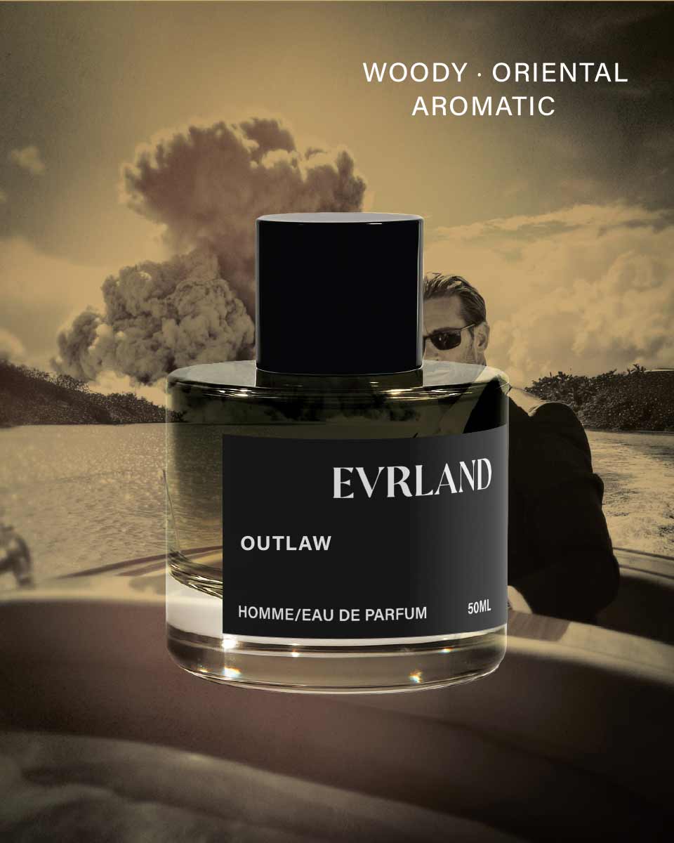 Evrland Outlaw perfume bottle with a scenic background