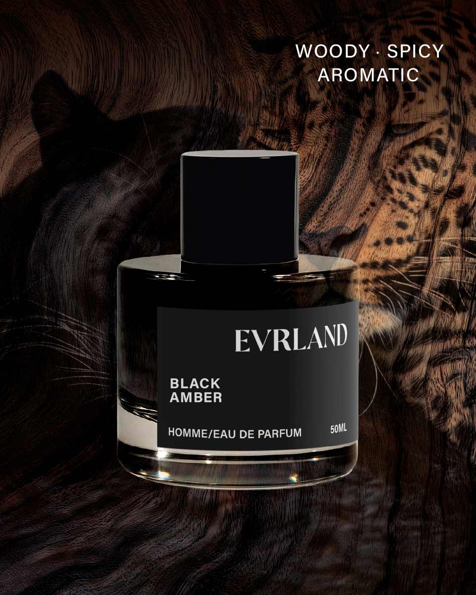 Black Amber perfume bottle by Evrland with a leopard in the background