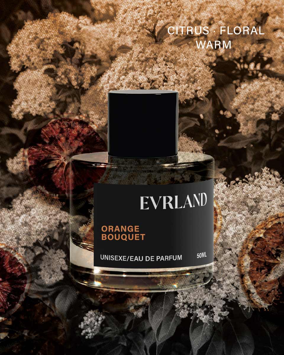 Evrland Orange Bouquet perfume bottle with dried flowers in the background